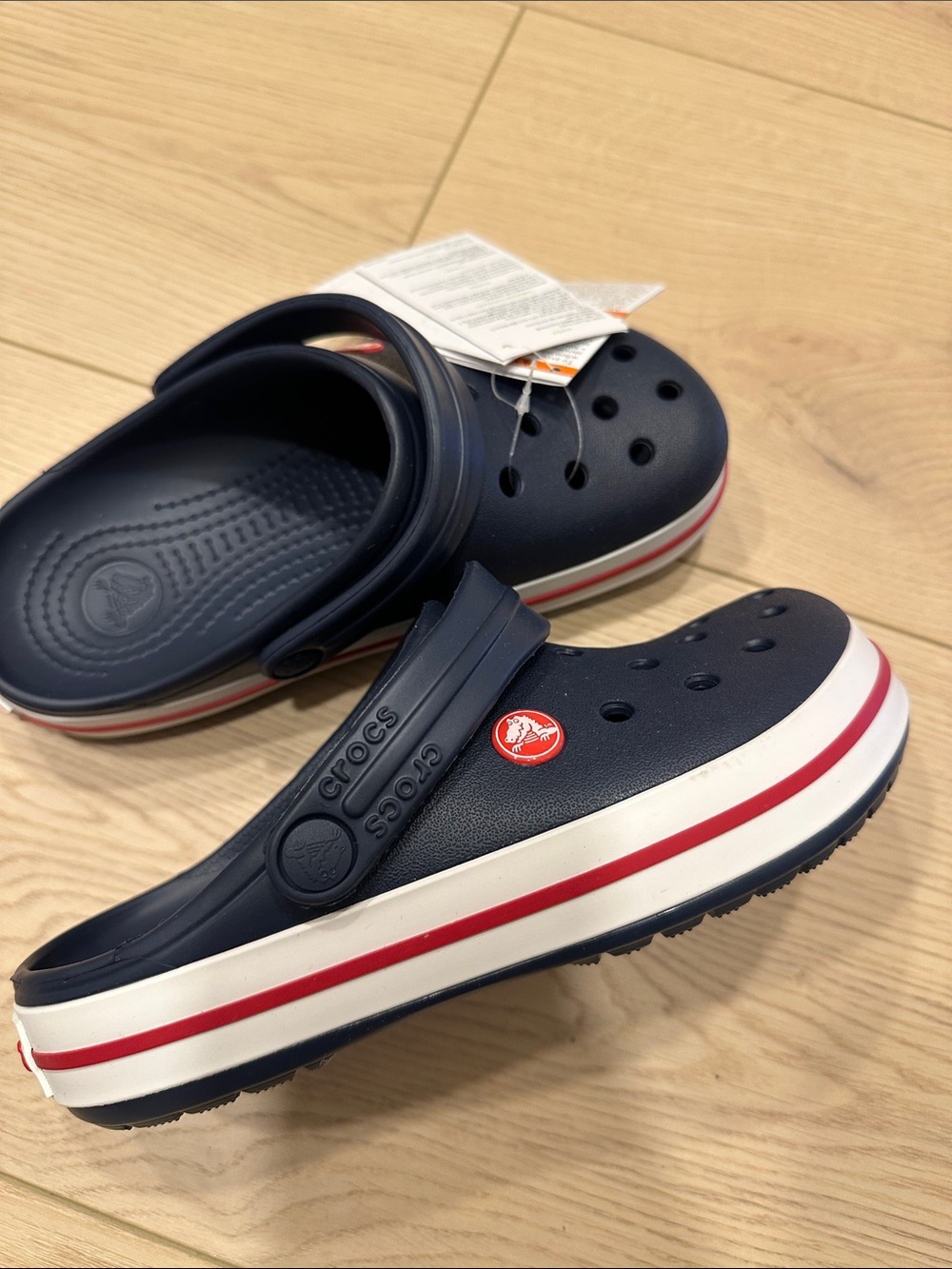 CROCS Kids Navy Clogs with Red and White Stripe Detail